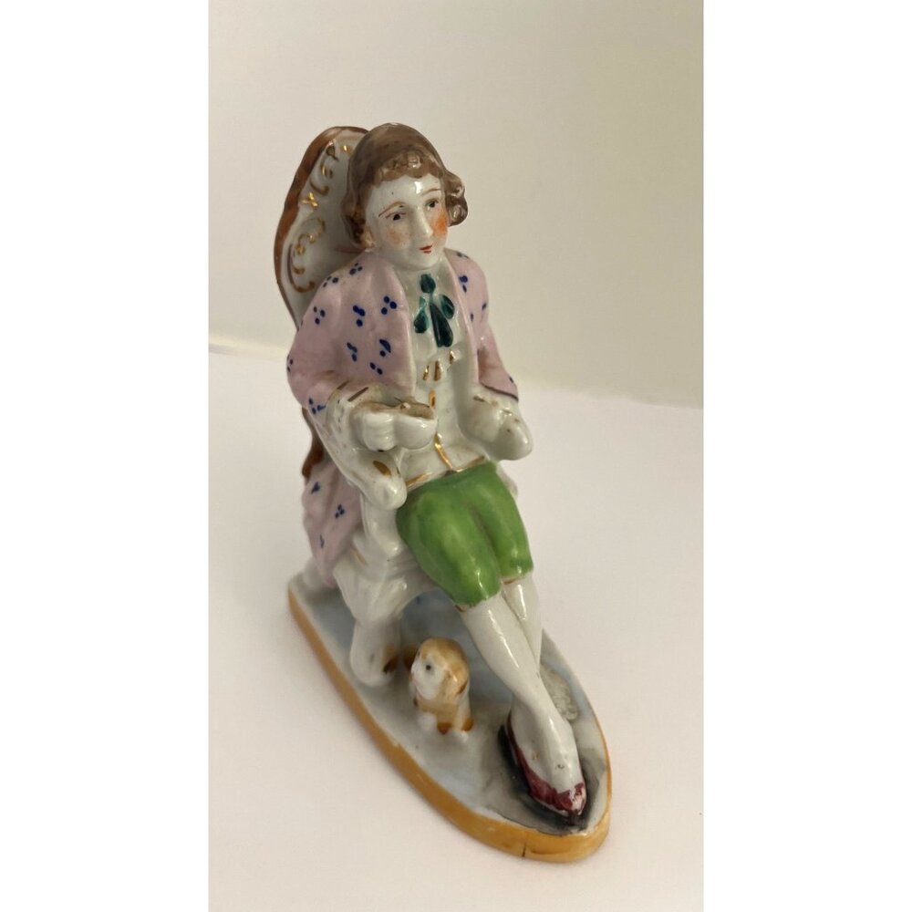 Vintage Porcelain Figurine Man in Chair with Dog Hand Painted 5 1/2”